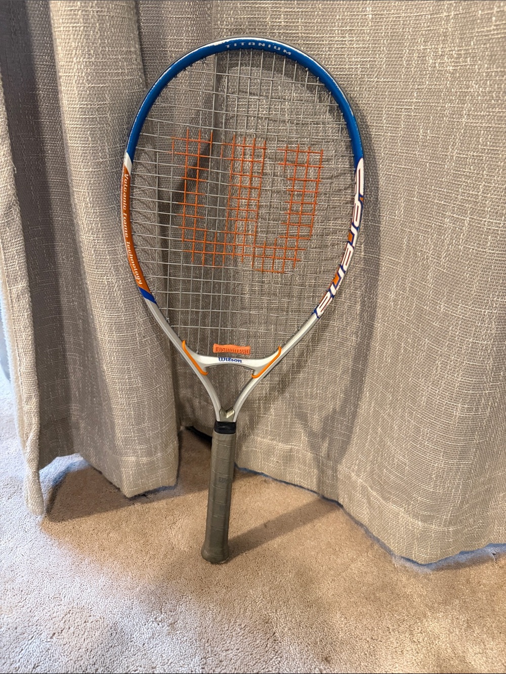 Wilson Blue, Orange & Silver Tennis Racket - Recreational Play